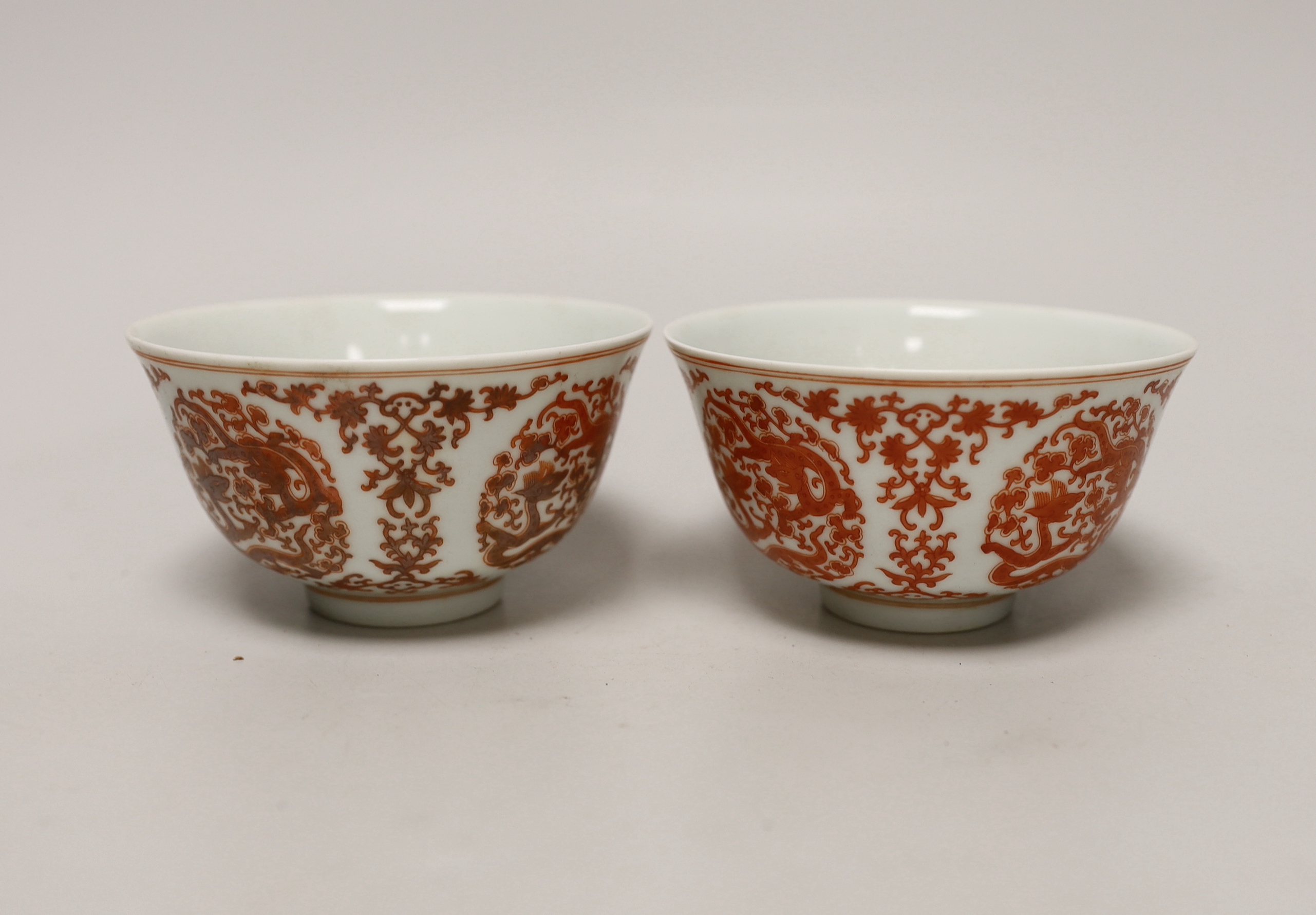 A pair of Chinese iron-red enamelled bowls, 11.5cm diameter